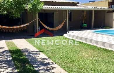 Imagem: A casa possui 4 Dormitórios, 3 Banheiros, 4 Vagas na garagem