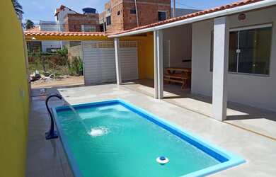 Imagem: A casa possui 2 Dormitórios, 2 Banheiros, 1 Vaga na garagem