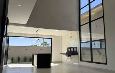 Imagem: A casa possui 4 Dormitórios, 5 Banheiros, 4 Vagas na garagem