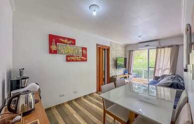 Imagem: O apartamento possui 2 Dormitórios, 1 Banheiro, 1 Vaga na garagem