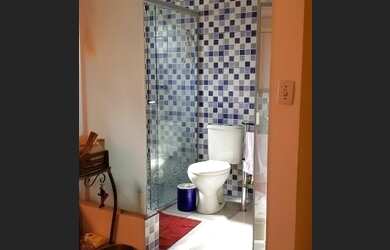 Imagem: A casa possui 5 Dormitórios, 4 Banheiros, 3 Vagas na garagem