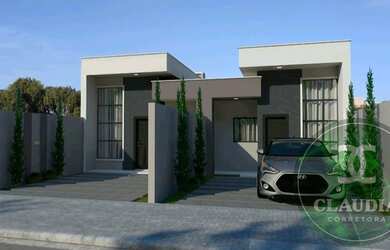 Imagem: A casa possui 3 Dormitórios, 2 Banheiros, 2 Vagas na garagem