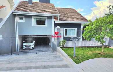 Imagem: A casa possui 4 Dormitórios, 5 Banheiros, 2 Vagas na garagem