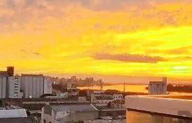 Imagem 3: Vista por do sol Guaiba. Piscina, Churrasqueira, Imóvel mobiliadoeAr-condicionado