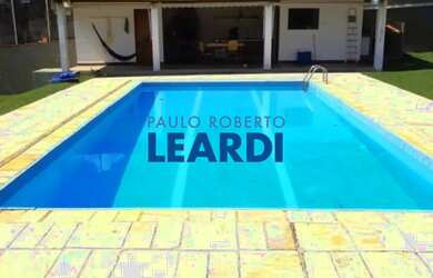 Imagem: A casa possui 5 Dormitórios, 3 Banheiros, 4 Vagas na garagem