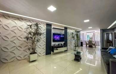 Imagem: A casa possui 3 Dormitórios, 5 Banheiros, 3 Vagas na garagem