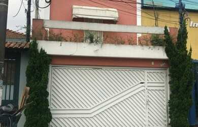 Imagem: A casa possui 3 Dormitórios, 2 Banheiros, 3 Vagas na garagem