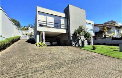 Imagem: A casa em condomínio possui 4 Dormitórios, 5 Banheiros, 5