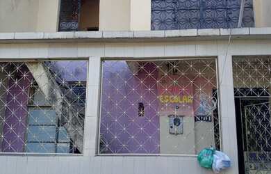 Imagem: A casa possui 4 Dormitórios, 2 Banheiros e está localizado