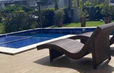 Imagem: A casa possui 5 Dormitórios, 5 Vagas na garagem e está localizado