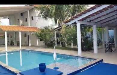 Imagem: A casa em condomínio possui 4 Dormitórios, 5 Banheiros, 4