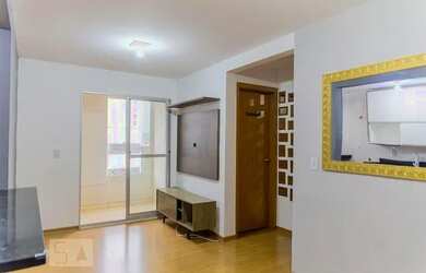 Imagem: O apartamento possui 2 Dormitórios, 1 Banheiro, 1 Vaga na garagem