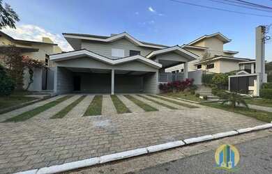 Imagem: A casa possui 4 Dormitórios, 4 Banheiros, 4 Vagas na garagem