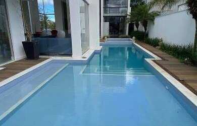 Imagem: A casa em condomínio possui 4 Dormitórios, 5 Banheiros, 4