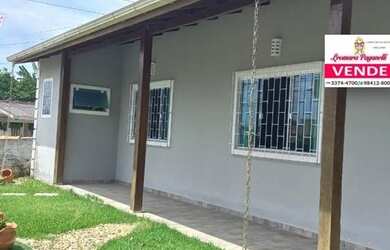 Imagem: A casa possui 2 Dormitórios, 2 Banheiros, 3 Vagas na garagem