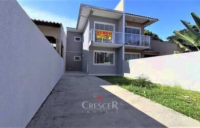 Imagem: A casa possui 3 Dormitórios, 2 Banheiros, 3 Vagas na garagem