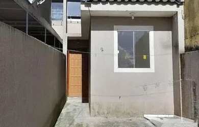 Imagem: A casa possui 3 Dormitórios, 1 Banheiro, 1 Vaga na garagem