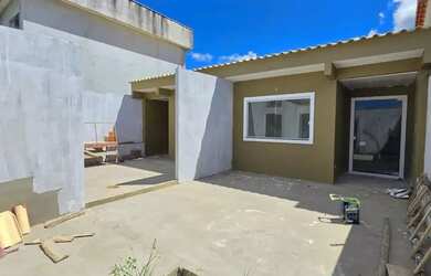 Imagem: A casa possui 2 Dormitórios, 1 Banheiro, 1 Vaga na garagem