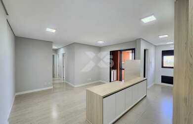 Imagem: O apartamento possui 3 Dormitórios, 2 Banheiros, 2 Vagas na