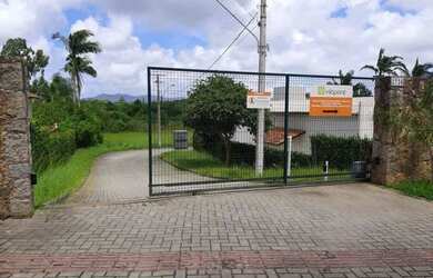 Imagem: A casa possui 3 Dormitórios, 4 Banheiros, 4 Vagas na garagem