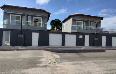 Imagem: A casa possui 2 Dormitórios, 3 Banheiros, 2 Vagas na garagem