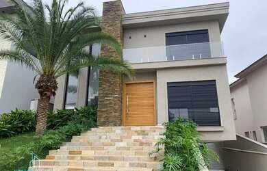 Imagem: A casa em condomínio possui 4 Dormitórios, 5 Banheiros, 4