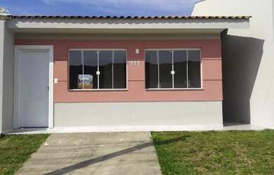 Imagem: A casa possui 3 Dormitórios, 1 Banheiro, 1 Vaga na garagem