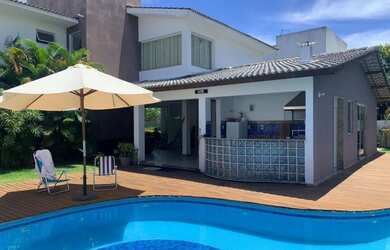 Imagem: A casa em condomínio possui 4 Dormitórios, 5 Banheiros, 3