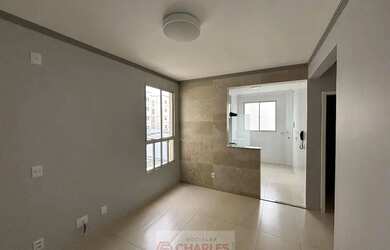 Imagem: O apartamento possui 2 Dormitórios, 1 Banheiro, 1 Vaga na garagem