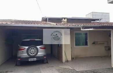 Imagem: A casa possui 4 Dormitórios, 3 Banheiros, 5 Vagas na garagem