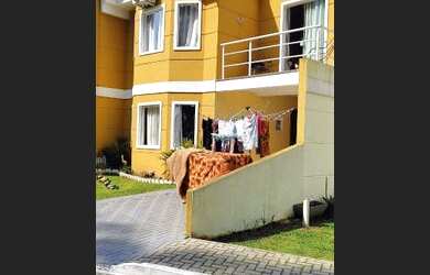 Imagem: A casa em condomínio possui 3 Dormitórios, 2 Banheiros, 3