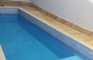 Imagem: A casa possui 3 Dormitórios, 3 Banheiros, 2 Vagas na garagem