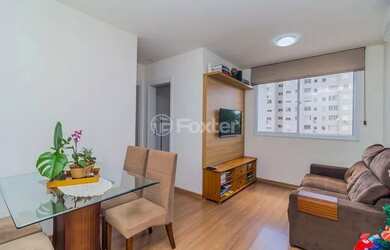 Imagem: O apartamento possui 2 Dormitórios, 1 Banheiro, 1 Vaga na garagem