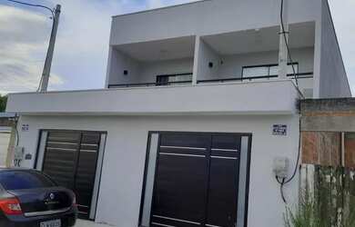 Imagem: A casa possui 2 Dormitórios, 3 Banheiros, 1 Vaga na garagem