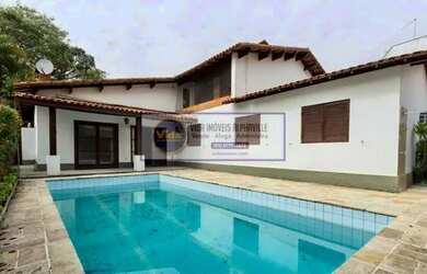 Imagem: A casa em condomínio possui 4 Dormitórios, 5 Banheiros, 4