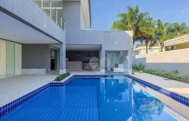 Imagem: A casa em condomínio possui 5 Dormitórios, 5 Banheiros, 5