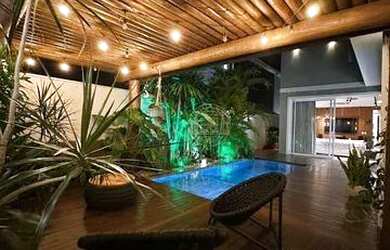 Imagem: A casa em condomínio possui 4 Dormitórios, 5 Banheiros, 4