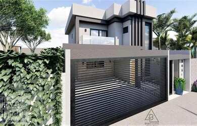 Imagem: A casa possui 3 Dormitórios, 2 Banheiros, 2 Vagas na garagem