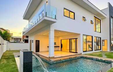 Imagem: A casa em condomínio possui 4 Dormitórios, 5 Banheiros, 4