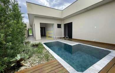 Imagem: A casa possui 3 Dormitórios, 3 Banheiros, 4 Vagas na garagem