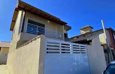 Imagem: A casa possui 2 Dormitórios, 3 Banheiros, 2 Vagas na garagem