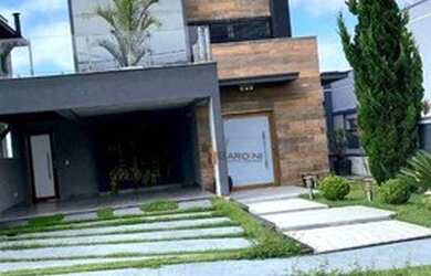 Imagem: A casa em condomínio possui 4 Dormitórios, 5 Banheiros, 4