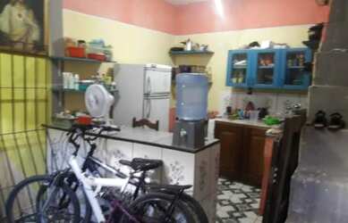 Imagem: A casa possui 3 Dormitórios, 1 Banheiro e está localizado