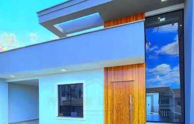 Imagem: A casa possui 3 Dormitórios, 2 Banheiros, 2 Vagas na garagem