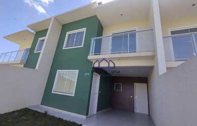 Imagem: A casa possui 3 Dormitórios, 2 Banheiros, 2 Vagas na garagem