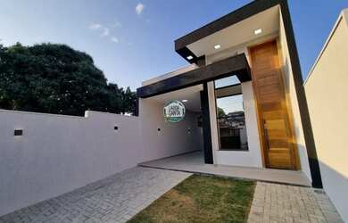 Imagem: A casa possui 3 Dormitórios, 2 Banheiros, 2 Vagas na garagem