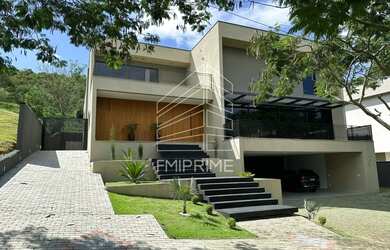 Imagem: A casa possui 5 Dormitórios, 5 Banheiros, 5 Vagas na garagem