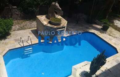 Imagem: A casa em condomínio possui 4 Dormitórios, 5 Banheiros, 5