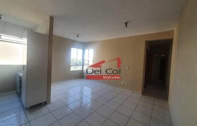 Imagem: O apartamento possui 2 Dormitórios, 1 Banheiro, 1 Vaga na garagem