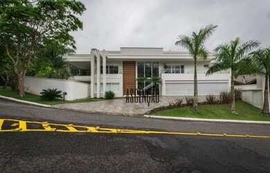 Imagem: A casa em condomínio possui 4 Dormitórios, 5 Banheiros, 5